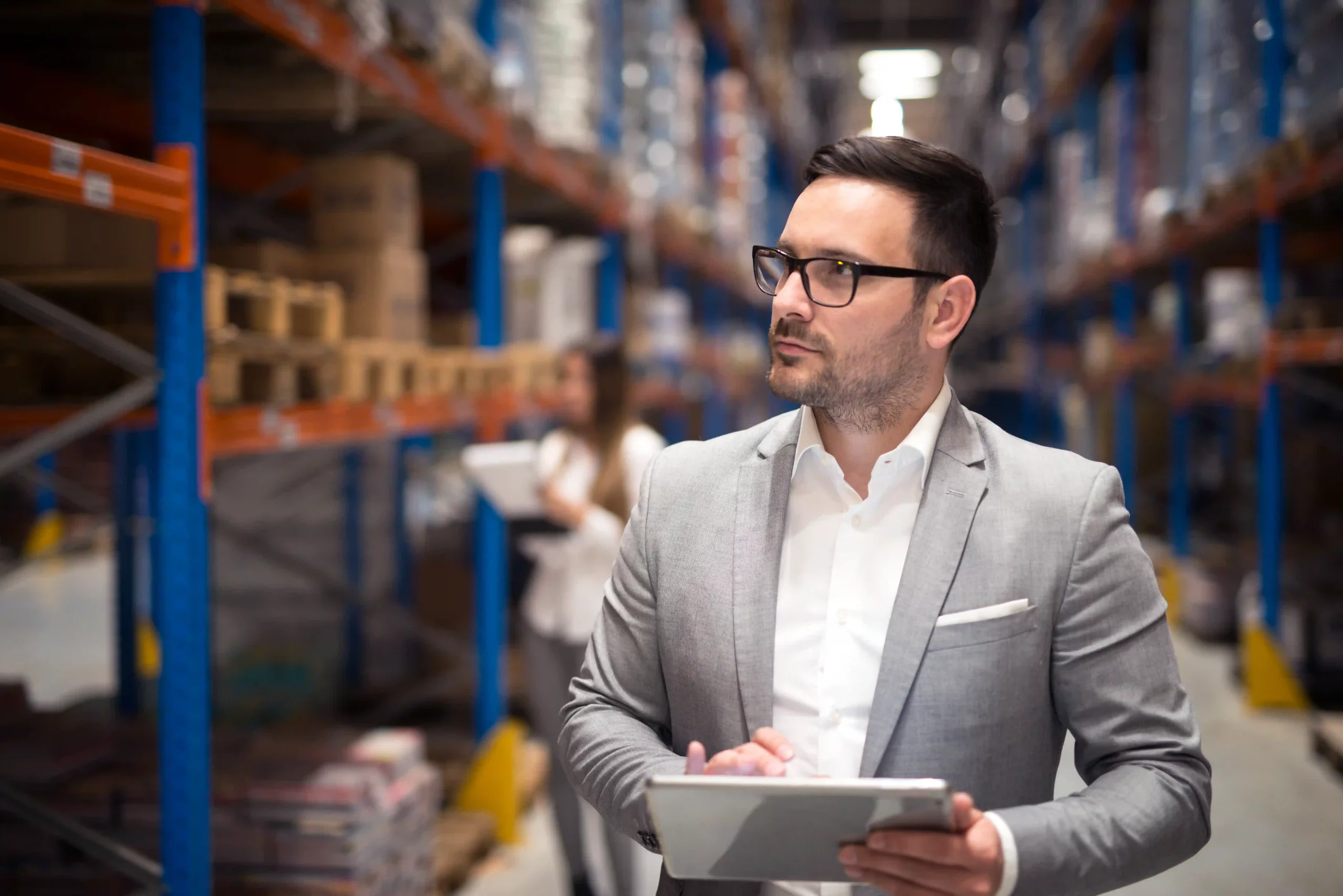 portrait-successful-businessman-warehouse-storage